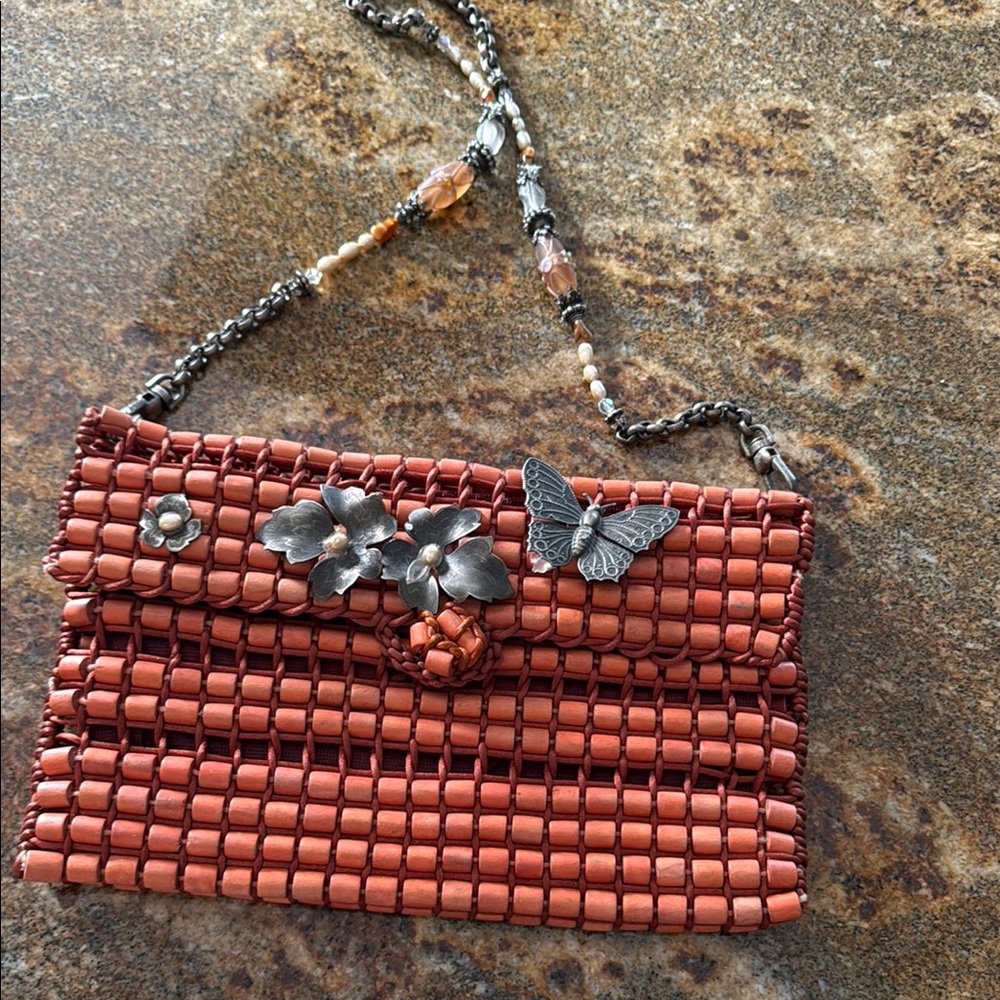 Elegant Beaded Clutch with Floral Accents